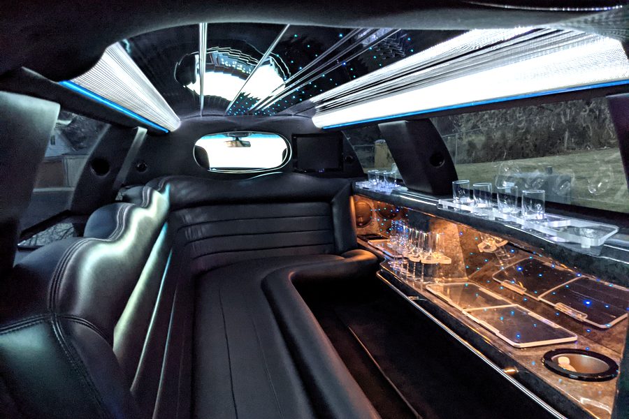 Party Bus — black luxury vehicle, front view
