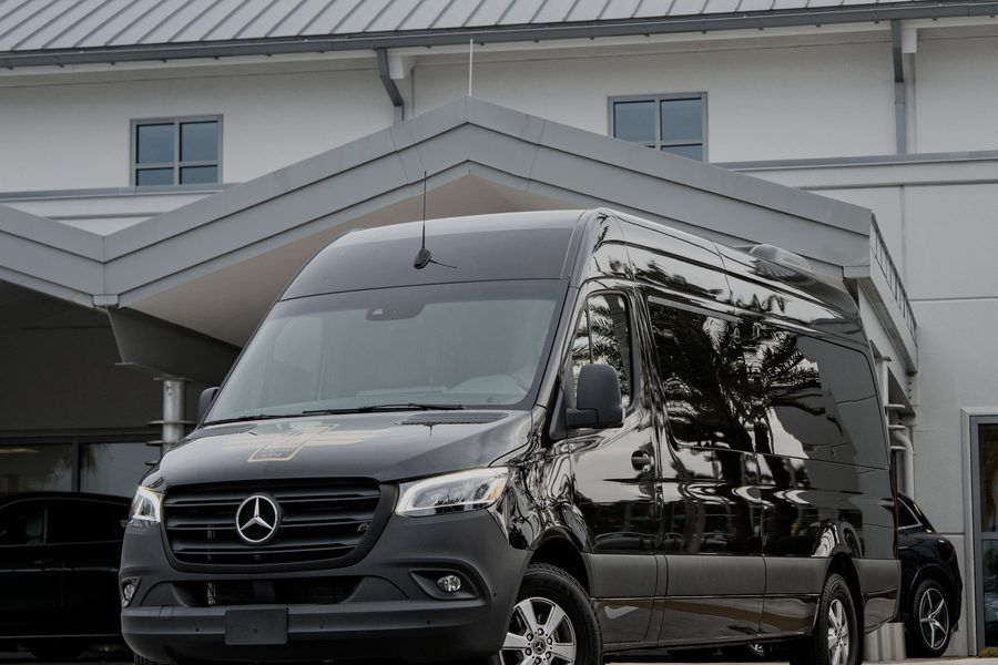 Executive Sprinter Van — black luxury vehicle, front view